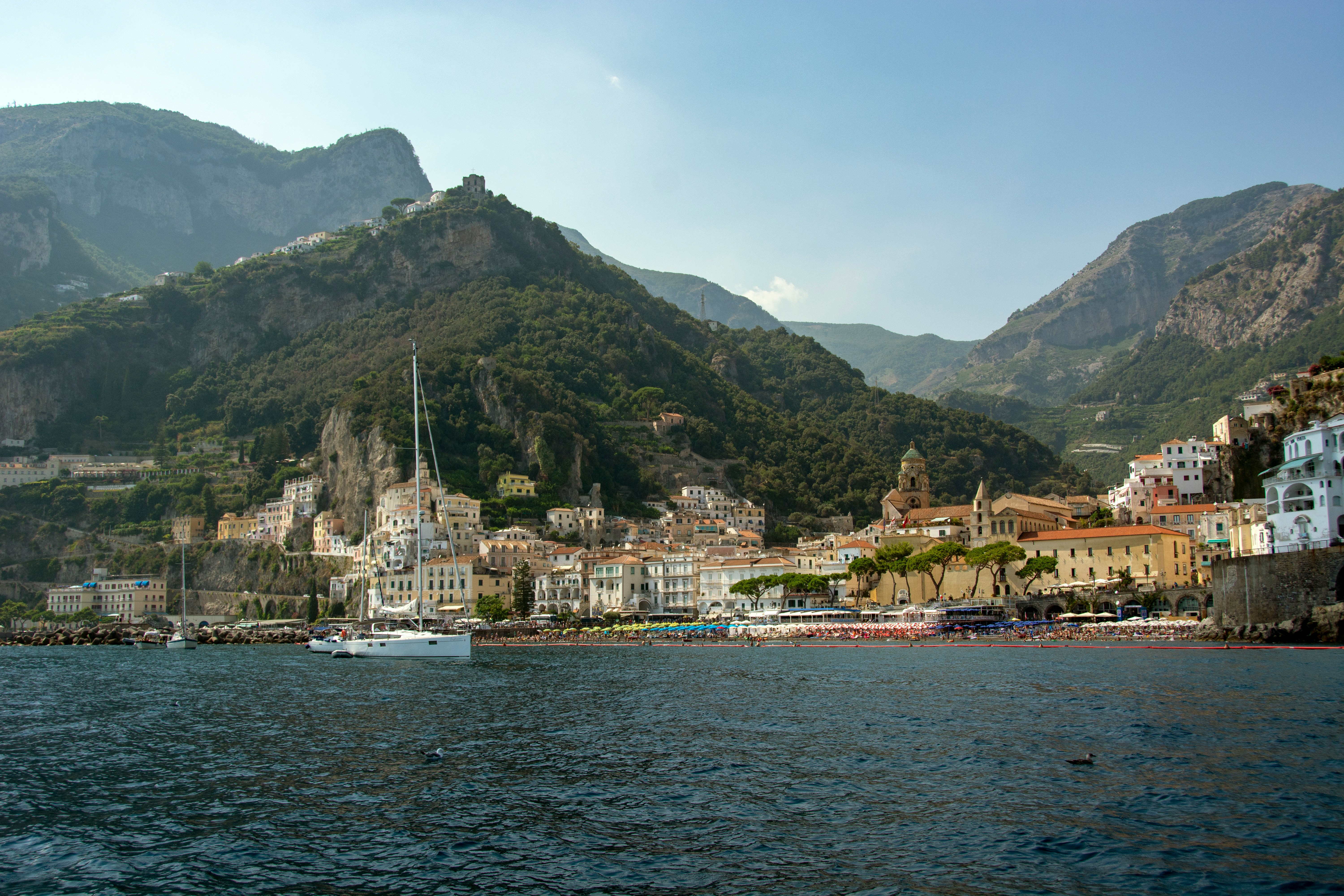 View of Amalfi town from the water, framed by mountains